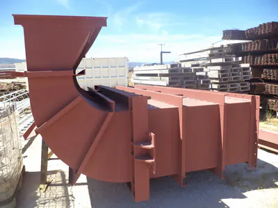 Red-primed duct section with a curved elbow