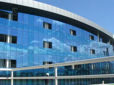 Curved glass facade of a multi-storey building