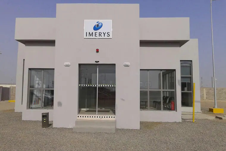Small single-storey building with the Imerys logo over its glazed entrance