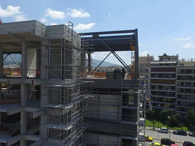 Concrete frame and scaffolding of a building under construction