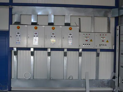 Electrical control panels on a wall inside a building
