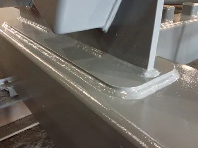 Welded base plate of a steel member, close up